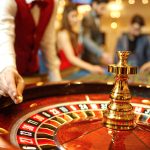 croupier rolling roulette ball for casino marketing materials_0